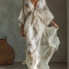 Women's Ivory And Taupe Chiffon Fabric Dolman Sleeve Maxi Dress With Twist Front & Palm Leaf Print