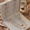 Elegant gold necklace with pearls